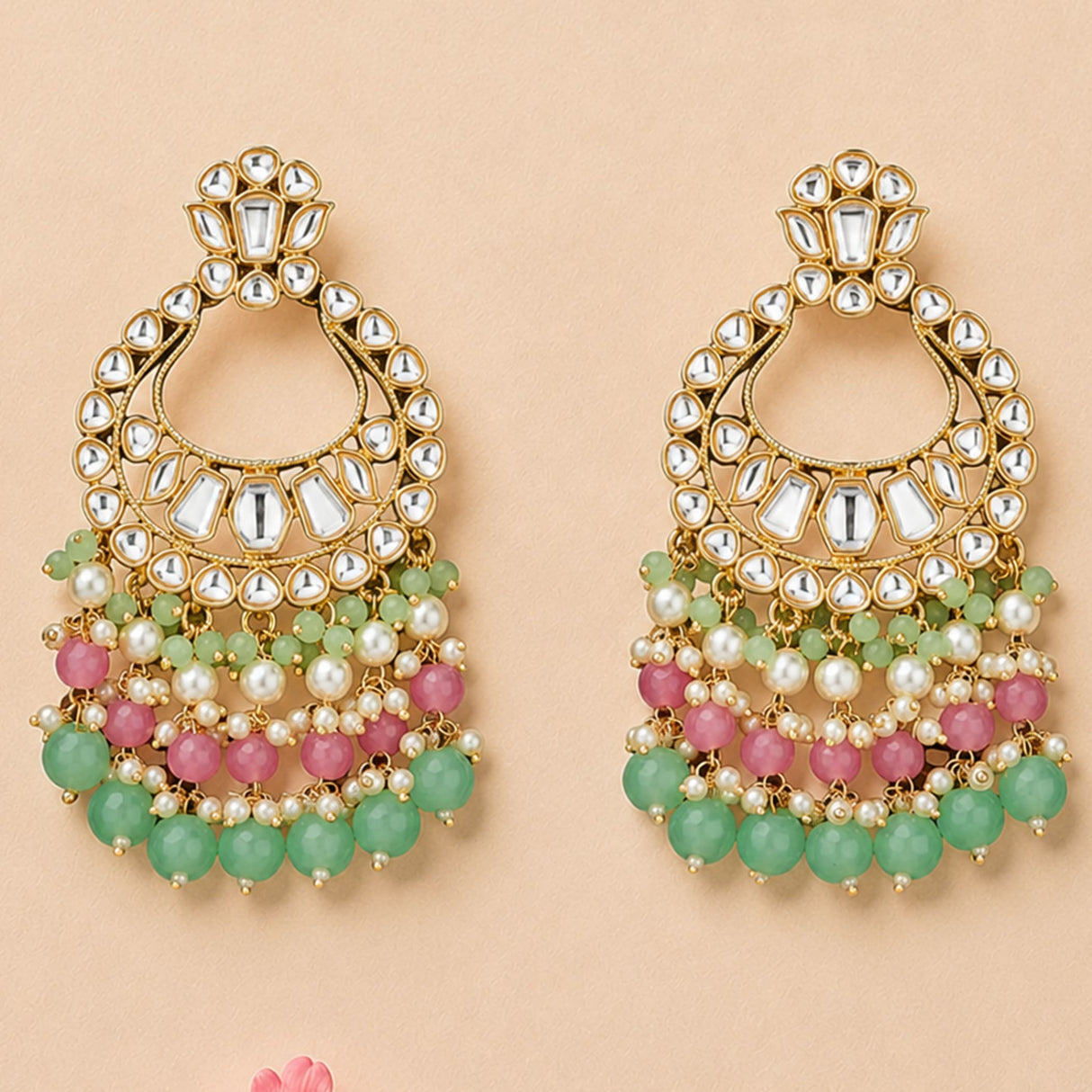 Oversized indian kundan gold tone chandelier earrings with intricate mirror work, mint green and pink beads, faux pearls