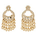 Oversized gold tone Kundan chandelier earrings with intricate mirror work and cascading cream faux pearls for ethnic wear