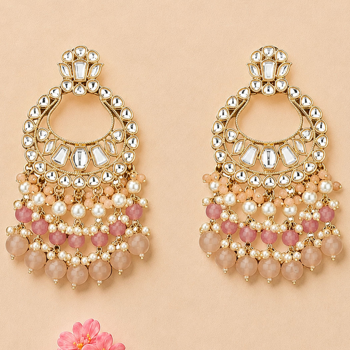 Oversized Indian kundan chandbali stud earrings in gold tone with clear and pink gemstones pearls and frosted beads for weddings