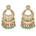 Gold tone oversized kundan chandbali earrings with clear stones pink and green beads and faux pearl accents for ethnic wear