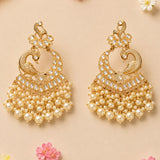Oversized indian peacock kundan chandelier earrings with gold tone, clear crystals, and cream faux pearl dangles for ethnic wear