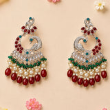 Silver peacock-shaped oversized kundan jhumka earrings with red green turquoise stones pearls and ruby-like beads for ethnic wear