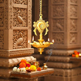 Golden brass Annam Shankh wall hanging oil lamp with peacock motifs, 5 lit wicks