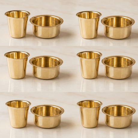 Set of eight golden brass cups with cylindrical shape and flared rim for south indian filter coffee serving
