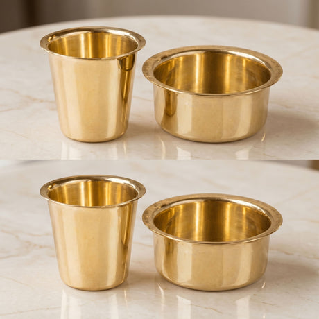 Set of two brass-colored cylindrical metal cups with flared rims for South Indian filter coffee and tea serving