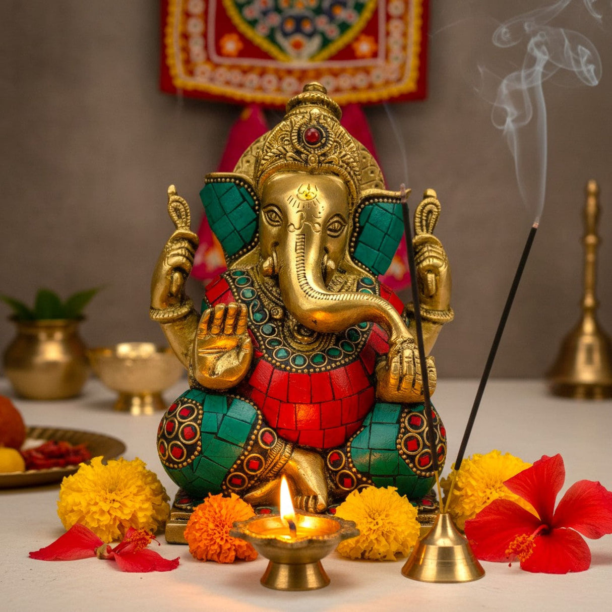 Golden Ganesha brass statue with red teal mosaic inlays and ruby gemstone