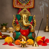 Golden Ganesha brass statue with red teal mosaic inlays and ruby gemstone
