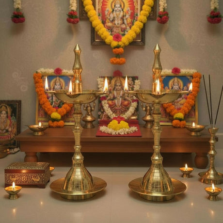 Brass oil lamp set with intricate designs and multiple wicks for Diwali decoration