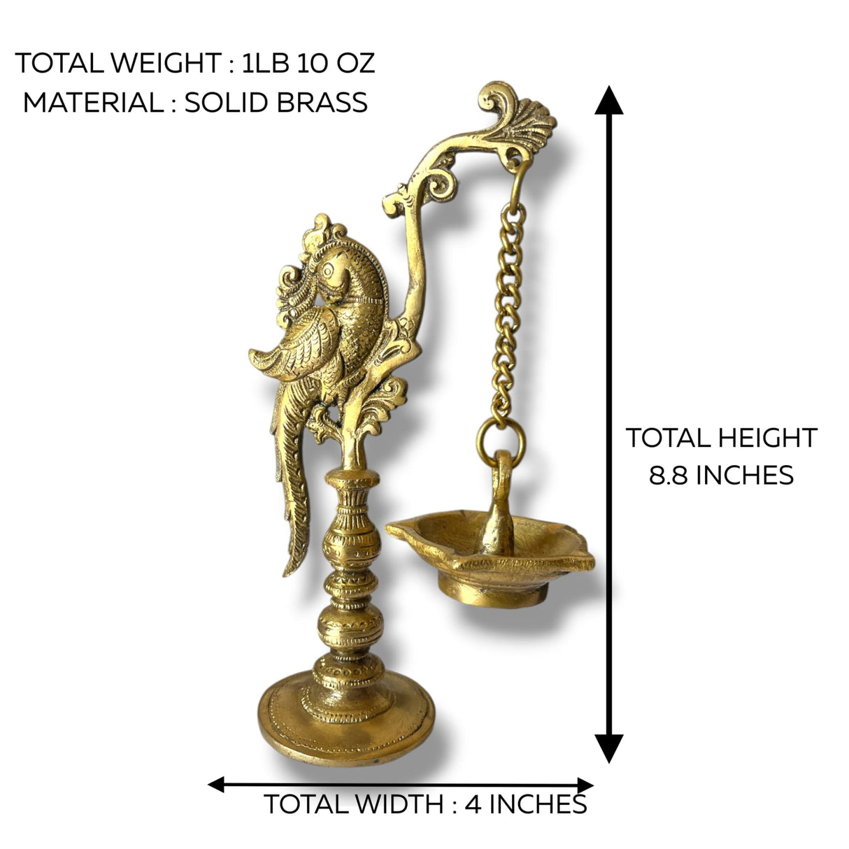 Golden brass annam oil lamp featuring an intricately detailed peacock on a decorative stand with hanging bowl for diwali decor