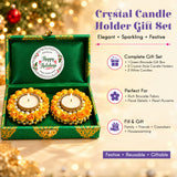 Green brocade gift box with two crystal-style tealight candle holders decorated with yellow roses and pearls for holidays