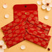 Red corduroy brocade fabric money envelope with gold paisley embroidery and metal clasps for indian wedding gifts