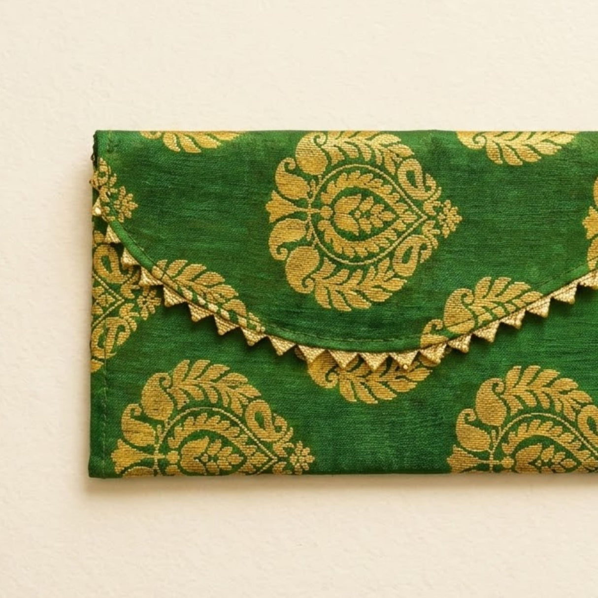Green brocade fabric money envelope with gold paisley embroidery scalloped edge for indian wedding gifts