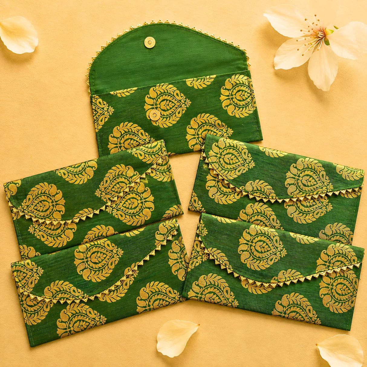 Brocade fabric money envelopes in green and gold paisley with lace trim for shagun lifafa cash gifts and savings