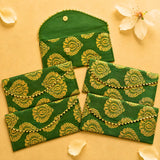 Brocade fabric money envelopes in green and gold paisley with lace trim for shagun lifafa cash gifts and savings
