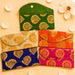 Brocade fabric money envelopes in green beige orange blue and pink with gold paisley embroidery for indian gift giving