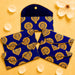Brocade fabric money envelope in deep blue velvet with intricate gold paisley embroidery and button closure for gifting