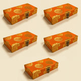 Orange brocade gift box with gold floral pattern and metallic clasp for indian muslim pakistani wedding favors