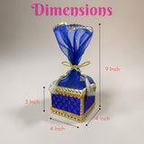 Blue and gold brocade potli gift box with sheer blue organza wrapping and bow for traditional indian wedding favors