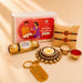 Gold-colored designer rakhi gift hamper keychain with engraved message and love you charm for brother and bhabhi