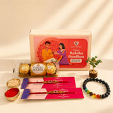 Designer rakhi gift hamper featuring a red rakhi with gold and silver beadwork symbolizing love and good luck