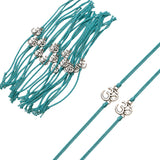 Teal-colored cord bracelets with silver-toned om symbol charms bulk rakhi for bhaiya and bhabhi traditional gift
