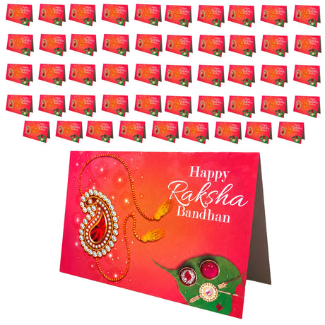 Red happy raksha bandhan greeting card with decorative paisley rakhi and green leaf for sibling bond protection and luck