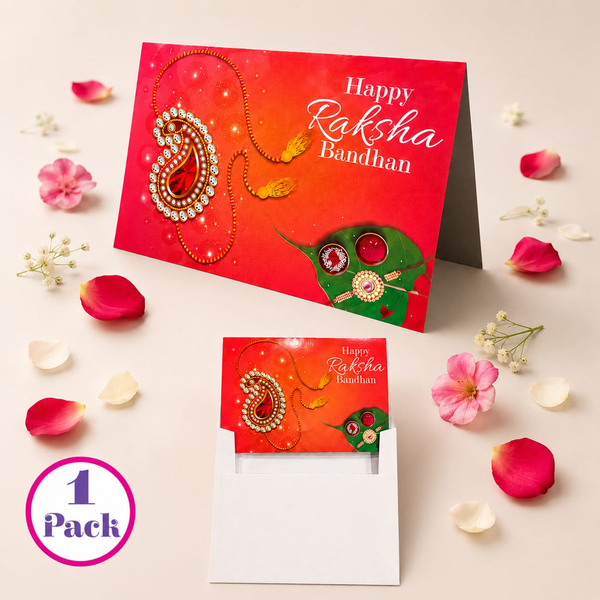 Red and orange happy raksha bandhan greeting card with jeweled paisley design and green leaf for sibling bond gift set
