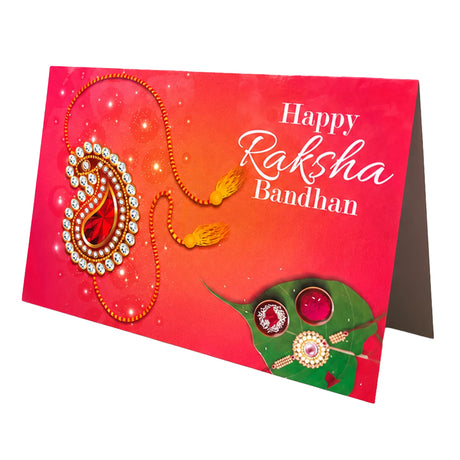 Vibrant red bulk rakhi greeting card set featuring a gold and white jeweled rakhi with orange tassels and green leaf motifs