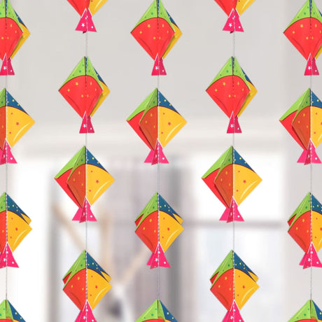 Colorful Happy Makar Sankranti mini kites in red, yellow, green, pink with stars on strings