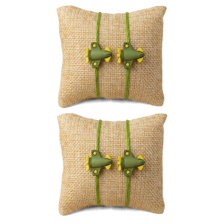 Olive green and yellow airplane themed cartoon rakhi bracelets on burlap pillows adjustable thread jewelry gift