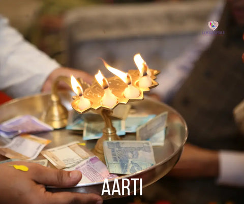 Ceremonial oil lamp on currency notes symbolizing Bhai Dooj and sibling relationships.