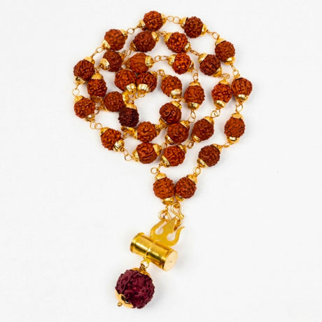 Golden chain necklace with brown textured rudraksha beads and flame-shaped pendant for meditation and prayer use