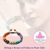 A double-layer chakra bracelet for men and women with smooth round earthy tone beads on black adjustable cord