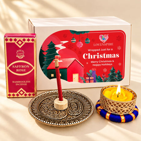 Red saffron rose bambooless incense stick in ornate brass holder in indian festive gift set for holiday gifting