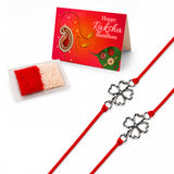 Red cord rakhi with silver heart-shaped four-leaf clover charms traditional protection and good luck bracelet gift