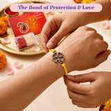 Silver four-leaf clover charm rakhi with bright yellow cord traditional raksha bandhan bracelet for brother and bhabhi
