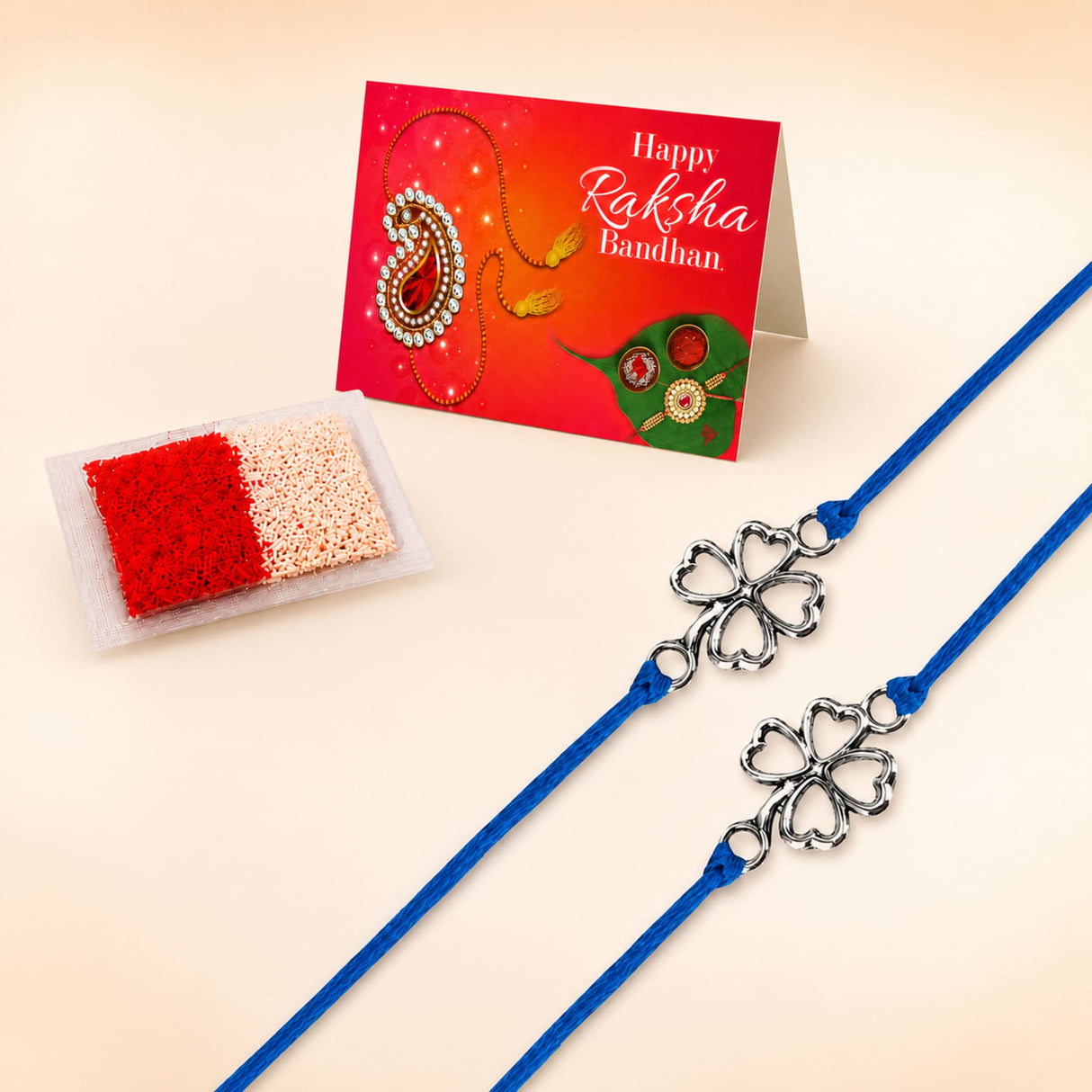 Blue cord rakhi with silver four-leaf clover charms traditional raksha bandhan bracelet for brother and bhabhi