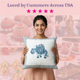 White cotton pillow cover with blue elephant embroidery and border