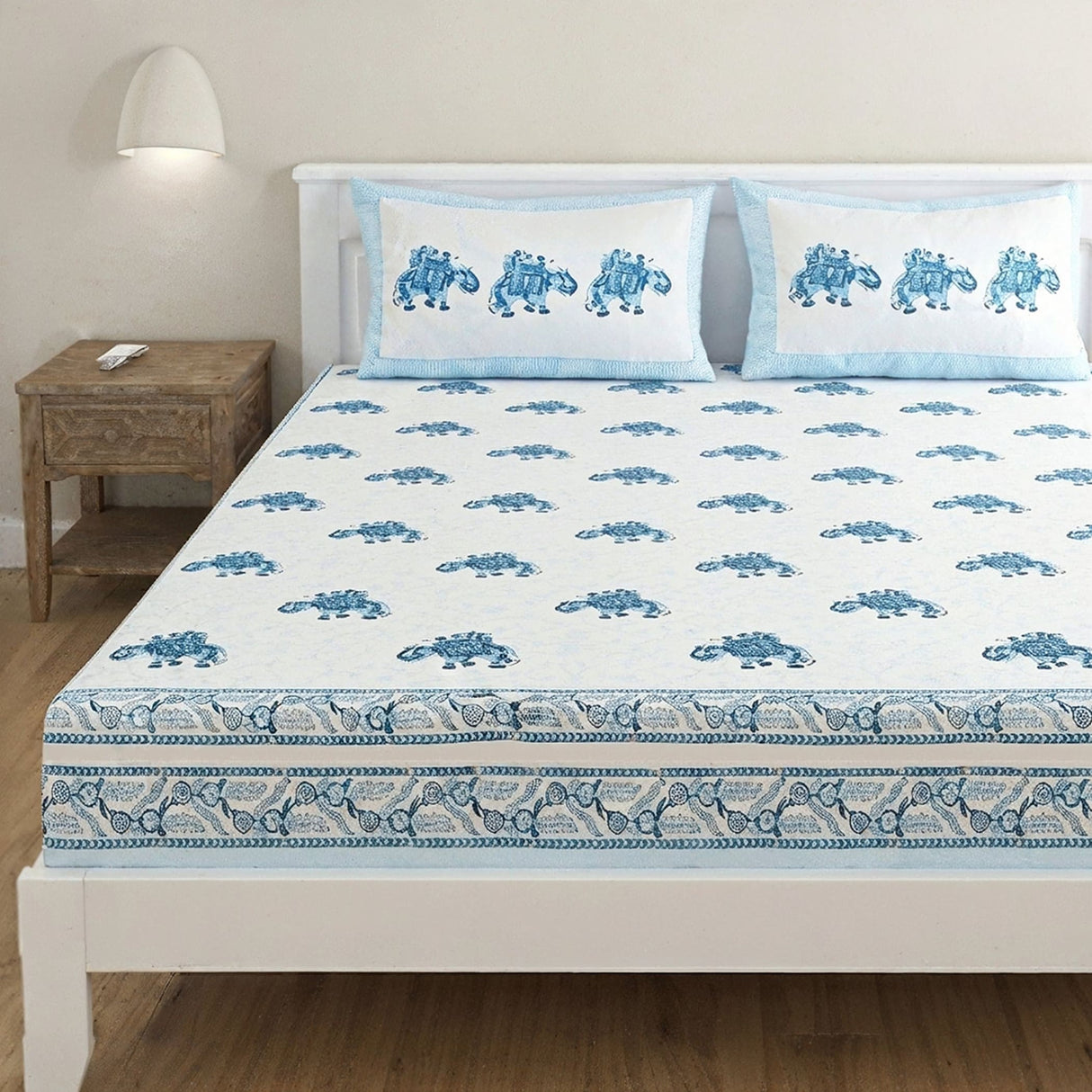 Indian hand block printed cotton sheet set with blue camel prints and decorative border
