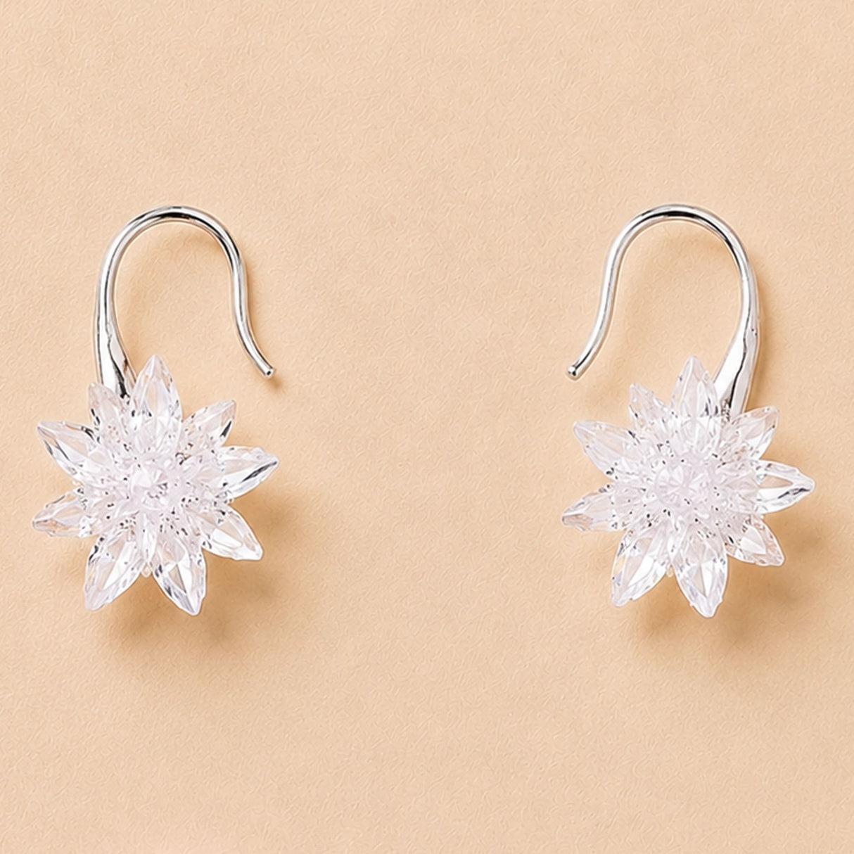 Clear star-shaped crystal dangle earrings with silver hooks in trendy Bollywood style for women birthday gift