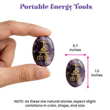 A smooth oval purple amethyst crystal reiki stone engraved with golden chinese characters for chakra balancing meditation