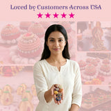 A woman in a white top holds colorful polished amethyst crystal reiki stones with engraved chakra symbols