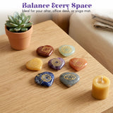 Set of seven heart-shaped amethyst chakra stones with golden geometric symbols for meditation and healing