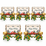 Gift box with green and gold elephant-shaped tealight candle holders featuring festive designs for Diwali and celebrations