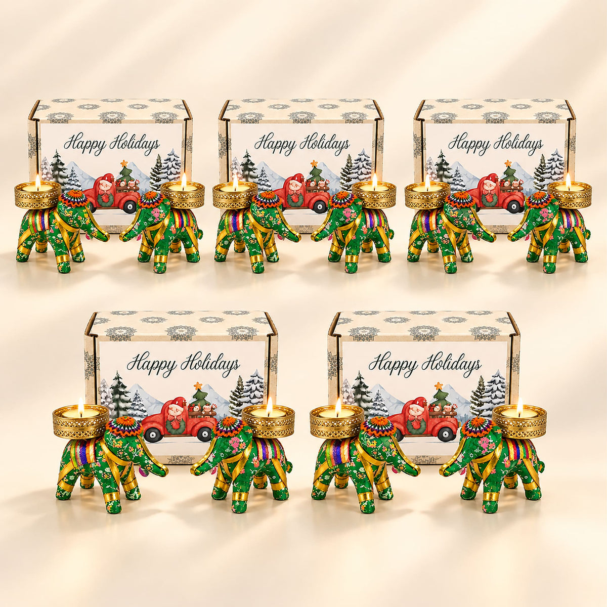Green and gold elephant-shaped tealight candle holders with festive holiday designs for Diwali pooja and gifting