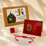 Personalized pink braided stainless steel name rakhi with silver beads and white nameplate for brother gift hamper