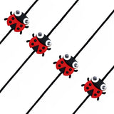 Cartoon animal rakhi for kids featuring red and black ladybug charms with shiny silver eyes on thin black cords