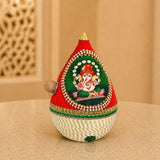 Red and green embroidered ganesha-themed decorative pot with gold trim beaded border and wooden knob for wedding pooja