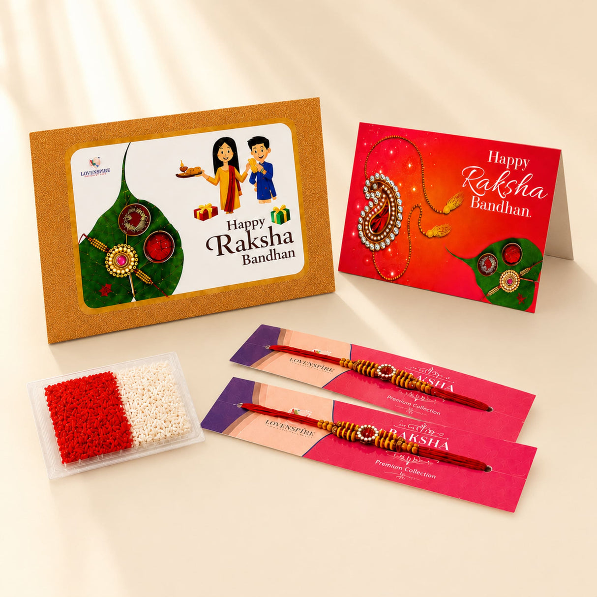Designer rakhi gift hamper featuring a red and gold raksha bandhan rakhi with intricate beadwork and central pendant
