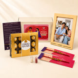 Designer rakhi gift hamper featuring golden ferrero rocher chocolates in shiny foil for raksha bandhan celebration